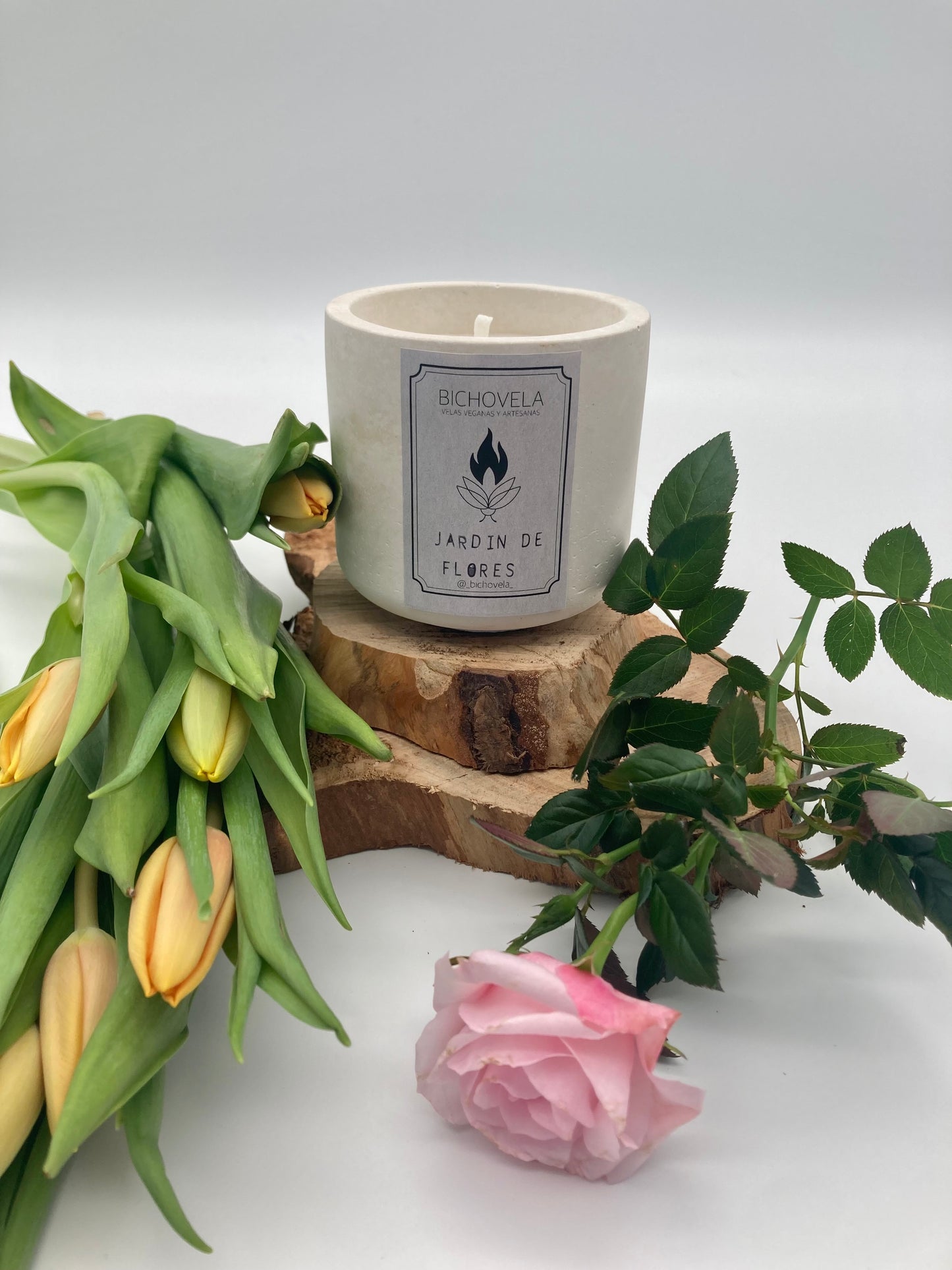 Vela jardín de flores